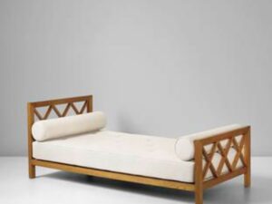 Single wooden bed in small bedroom Uganda